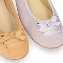 New suede leather Ballet flats with crossed ribbons.