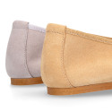 New suede leather Ballet flats with crossed ribbons.