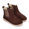 Suede leather ankle boots with animal print elastic band.