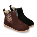 Suede leather ankle boots with animal print elastic band.