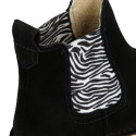 Suede leather ankle boots with animal print elastic band.