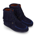 MOHICAN style Medium height ankle boots with fringed design in suede leather.