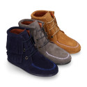 MOHICAN style Medium height ankle boots with fringed design in suede leather.