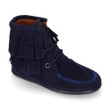 MOHICAN style Medium height ankle boots with fringed design in suede leather.