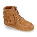 MOHICAN style Medium height ankle boots with fringed design in suede leather.