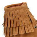 MOHICAN style Medium height ankle boots with fringed design in suede leather.