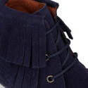 MOHICAN style Medium height ankle boots with fringed design in suede leather.