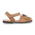 Nubuck leather Menorquina sandal shoes with hook and loop strap and fringed design.