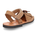 Nubuck leather Menorquina sandal shoes with hook and loop strap and fringed design.