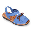 Nubuck leather Menorquina sandal shoes with hook and loop strap and fringed design.