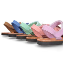 Nubuck leather Menorquina sandal shoes with hook and loop strap and fringed design.