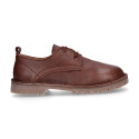 Zapato tipo Blucher Casual en piel lisa y suela gruesa.