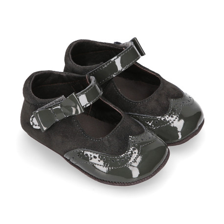 Combined leather little Mary Janes with hook and loop strap and ribbon for babies.