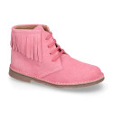 Suede leather ankle desert boots style with fringed design.