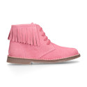 Suede leather ankle desert boots style with fringed design.