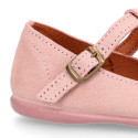 Pink Suede leather T-Bar Girl Mary Jane shoes with buckle fastening and chopped design.