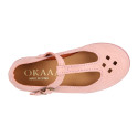Pink Suede leather T-Bar Girl Mary Jane shoes with buckle fastening and chopped design.