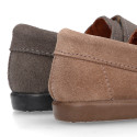 Suede leather Kids loafer shoes with hook and loop strap closure.