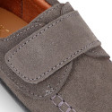 Suede leather Kids loafer shoes with hook and loop strap closure.