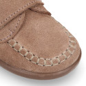 Suede leather Kids loafer shoes with hook and loop strap closure.