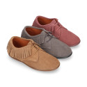 Kids Oxford shoes with fringes design and laces closure in suede leather.