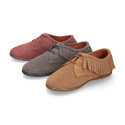 Kids Oxford shoes with fringes design and laces closure in suede leather.