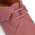 Kids Oxford shoes with fringes design and laces closure in suede leather.