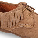 Kids Oxford shoes with fringes design and laces closure in suede leather.