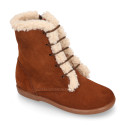 Kids suede leather little bootie with fake hair pipe design.