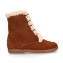 Kids suede leather little bootie with fake hair pipe design.