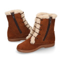 Kids suede leather little bootie with fake hair pipe design.