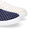 Cotton canvas bamba shoes with polka dots print.