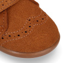 Classic suede leather little bootie Oxford style laceless and chopped design with fake hair neck.