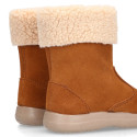 Kids suede leather boots with fur neck design in tan color.