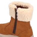 Kids suede leather boots with fur neck design in tan color.