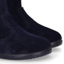 Deep blue suede leather girl boots with ribbon design.