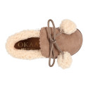 Booties with shoelaces closure with pompons and fake hair neck in suede leather for kids.