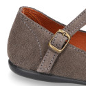 Suede leather T-Bar Girl Mary Jane shoes with buckle fastening and chopped design.