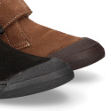 Suede leather ankle boot shoes laceless and with toe cap.