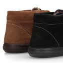 Suede leather ankle boot shoes laceless and with toe cap.