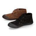 Suede leather ankle boot shoes laceless and with toe cap.