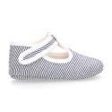 Cotton canvas T-strap shoes for babies with stripes print design.