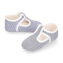 Cotton canvas T-strap shoes for babies with stripes print design.