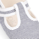 Cotton canvas T-strap shoes for babies with stripes print design.