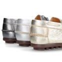 Metal finish nappa leather moccasin shoes with bows for large sizes.