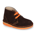 Suede safari boots with contrast stitching, laces and Outsole.