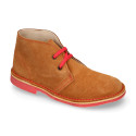 Suede safari boots with contrast stitching, laces and Outsole.