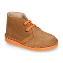 Suede safari boots with contrast stitching, laces and Outsole.