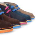 Suede safari boots with contrast stitching, laces and Outsole.