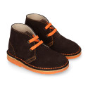 Suede safari boots with contrast stitching, laces and Outsole.